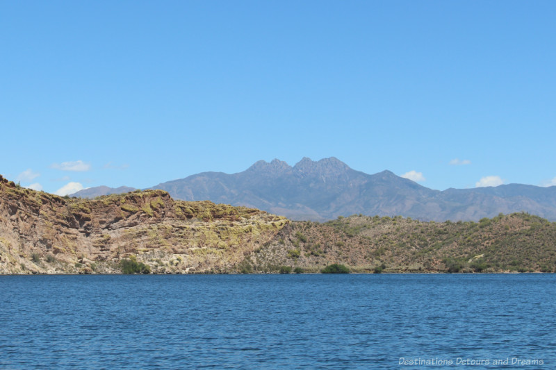 Blue waters of Lake Saguaro with desert mountains in the background