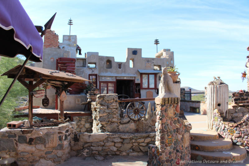 Phoenix Mystery Castle Quirky rustic entrance with stone covered walls to Mystery Castle in Phoenix