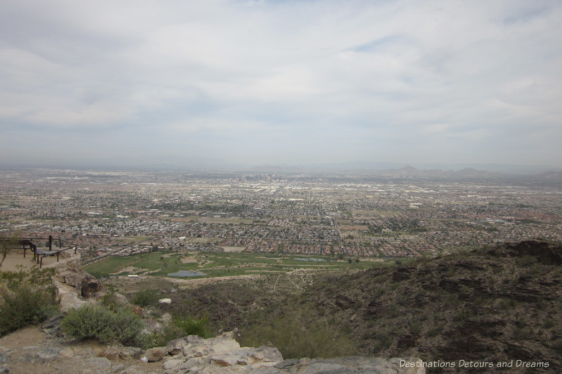 View of sprawling metropolis of Greater Phoenix from lookout point in South Mountain Park