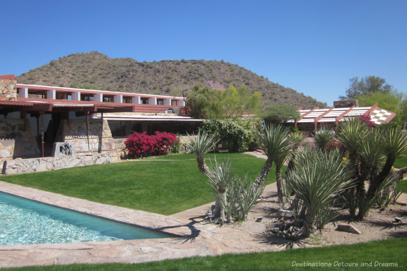 Scottsdale Taliesin West Frank Lloyd Wright designed brick-faced house blending into desert landscape at Taliesin West
