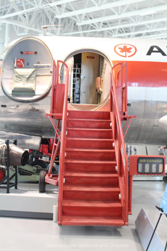 Red stairs leading into a Vikers Viscount airplane