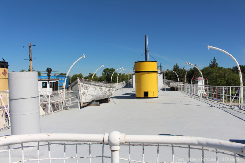 Top of the S.S. Keenora at Marine Museum of Manitoba has a wooden canoe sitting on it