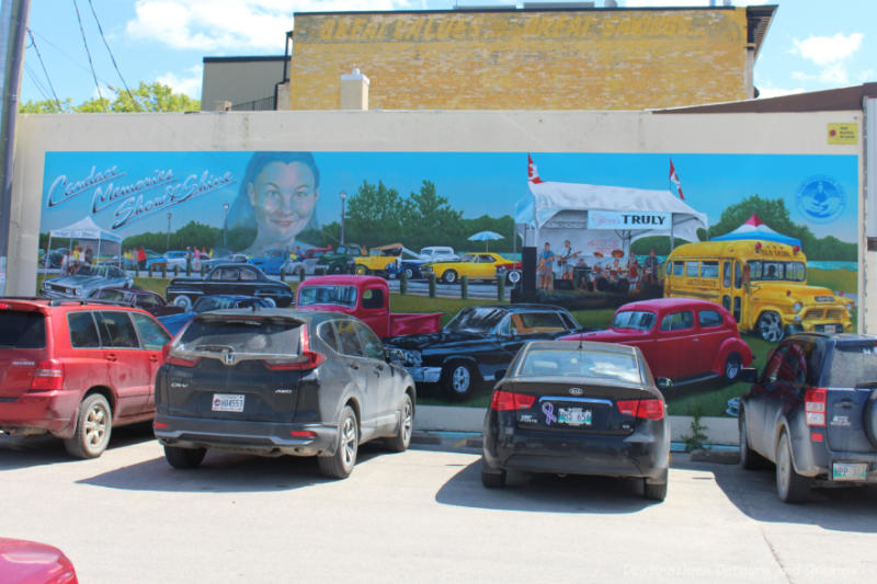 Mural of vintage cars on a grassy lawn at the Candance Memories Show & Shine fundraiser