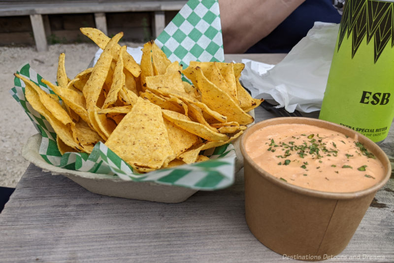 The Beer Can Chips + Dip Tortilla chips and creole cream cheese dip