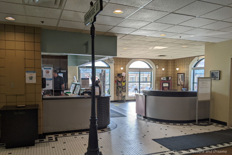 Café area with a few tables and a food counter