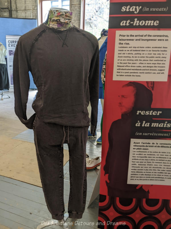 Headless mannequin wearing grey sweatshirt and lounging pants