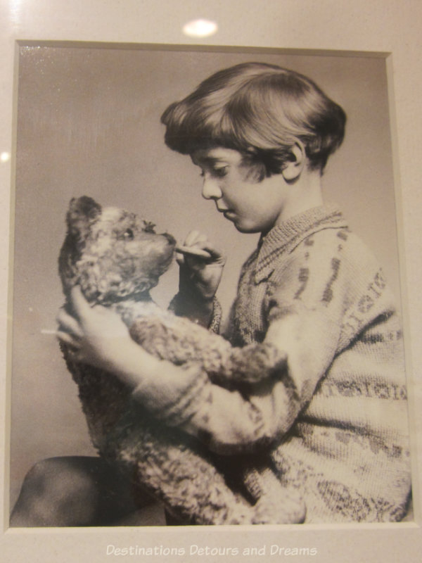 Photograph of Christopher Robin Milne and his teddy bear