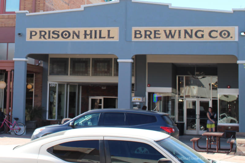 The blue-coloured front of Prison Hill Brewing