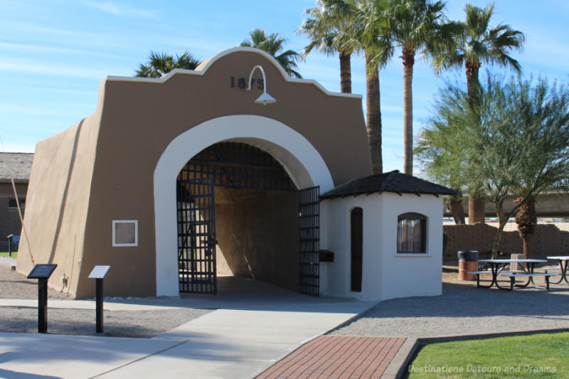 An adobe style structure that is the entry gate to a former prison in Yuma