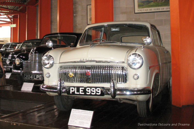 Row of old cars in a motor museum