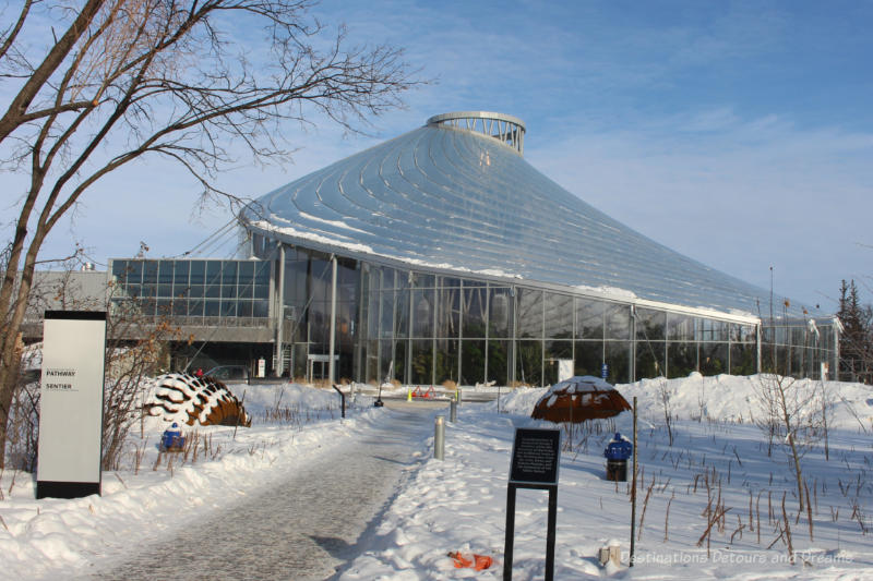 The Leaf Building Conservatory building with glass falls and curving glass rook unfurling like a blossom