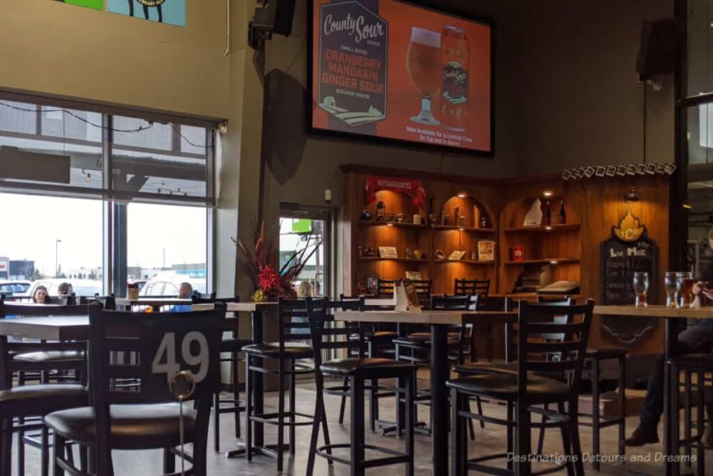 Brewery taproom with a collection of bar tables