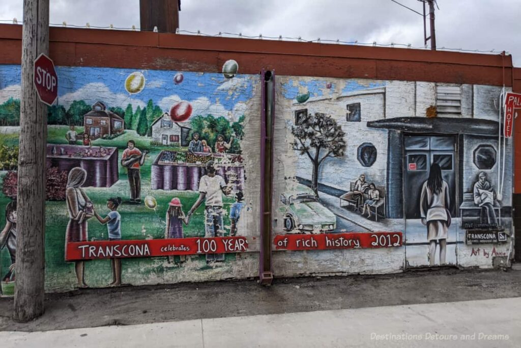 Mural celebrating 100 years of Transcona history shows families, and an old hotel