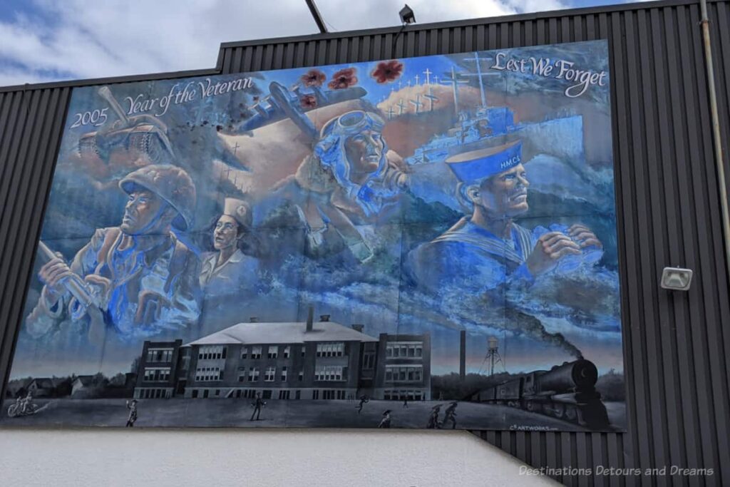 A 2005 Year of the Veteran mural in the Transcona neighbourhood of Winnipeg, Manitoba pictures soldiers from different military branches and Transcona landmarks, such as the school and the railway.