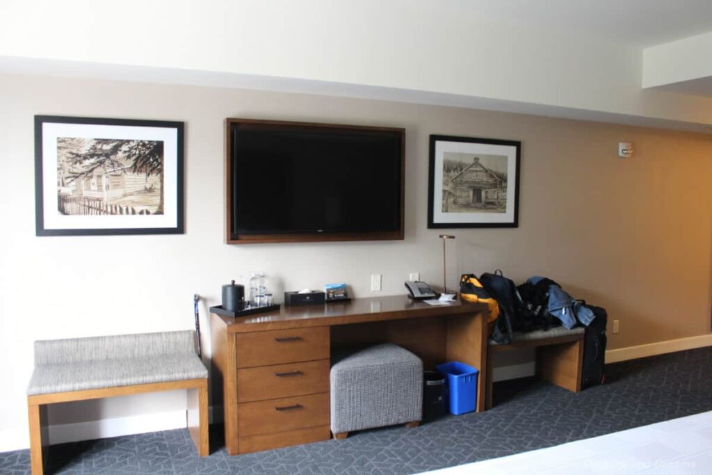 The Malcolm Desk desk and suitcase area of The Malcolm hotel