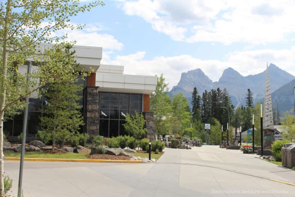 Modern building with a view of mountains in the background