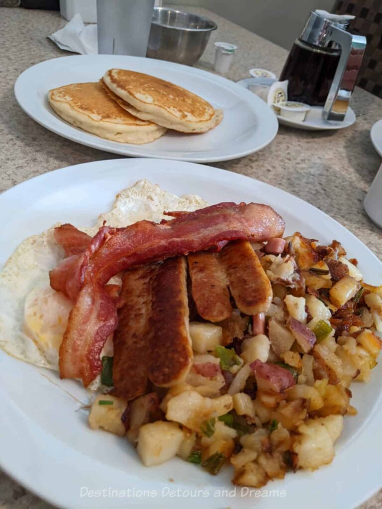 A hearty breakfast of pancakes, eggs, bacon, sausage, and hashbrowns at Veroba's in Moose Jaw