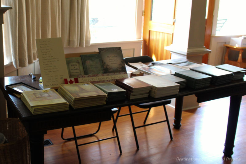 Helen Stewart Book Table Long table containing display of author books