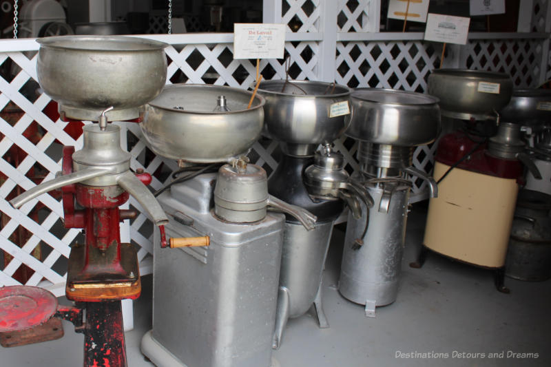Display of several cream separators in a museum