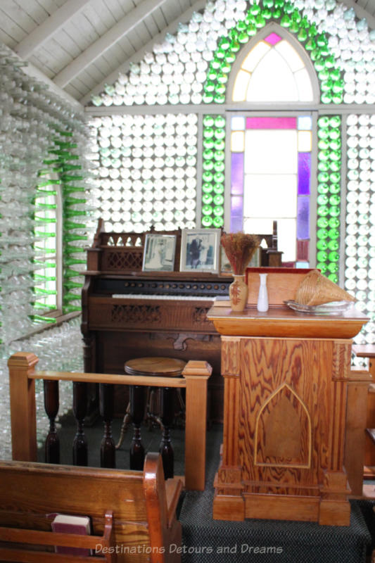 Pulpit area of glass bottle church