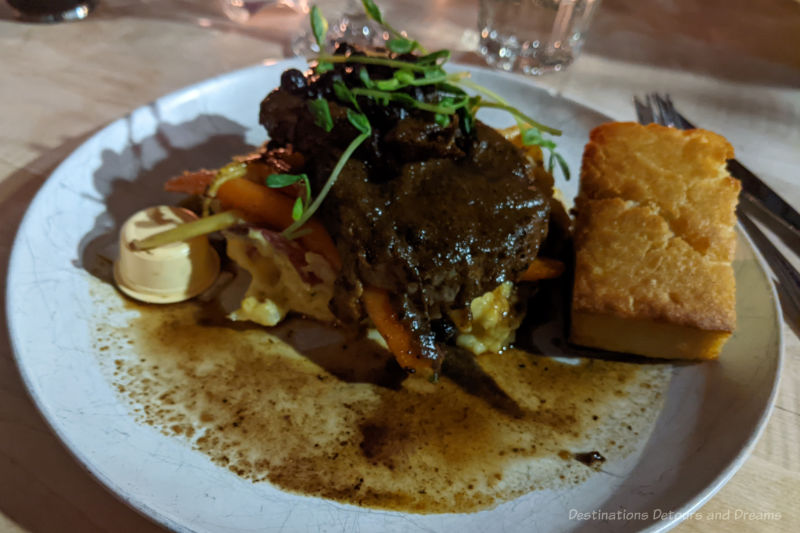 Winnipeg Food Bison Roast Bison roast garlic potato squash mash, seasonal vegetables, and bannock at Feast