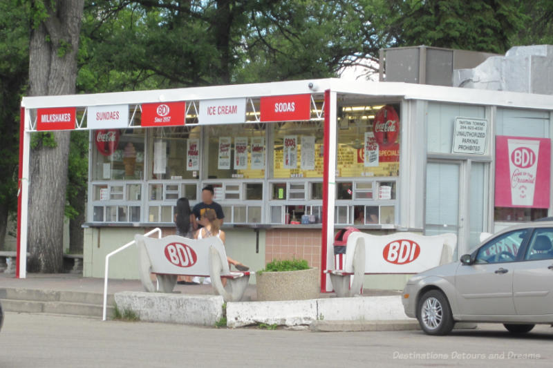 Winnipeg Food BDI The front of a take-out ice cream store with covered area in front of window