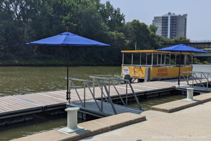 The Forks Waterways Tour Boat Tour boat parked at dock