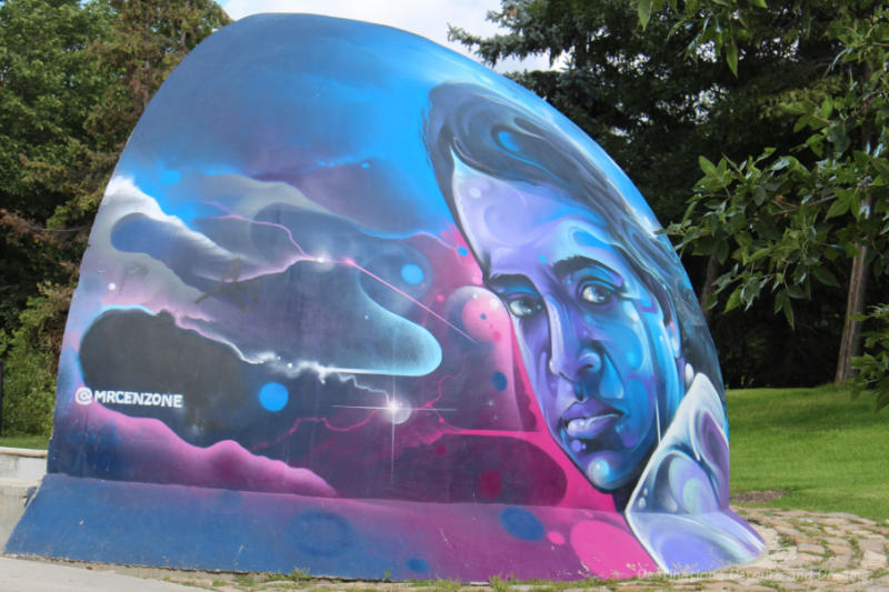 The Fork Jai Pereira Mural Mural on a half-domed structure in translucent shades of blue and rose of a man