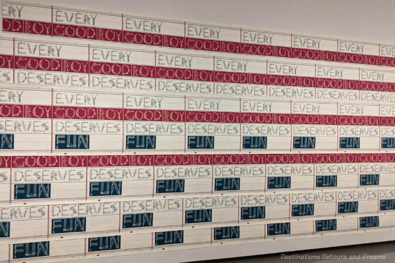 Staycation Good Boy Large art work featuring lines with repeating words - Every Good Boy Deserves Fun