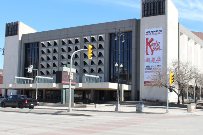 Winnipeg Centennial Concert Hall Brutalism-style concert hall of whitish stone with a covered entryway in front and featuring triangular shaped windows