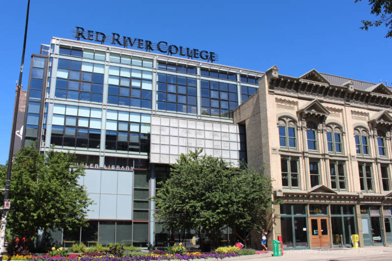 Winnipeg RRC Roblin Building College building with new section featuring glass windowed walls connected to a facade of early 20th-century buildings