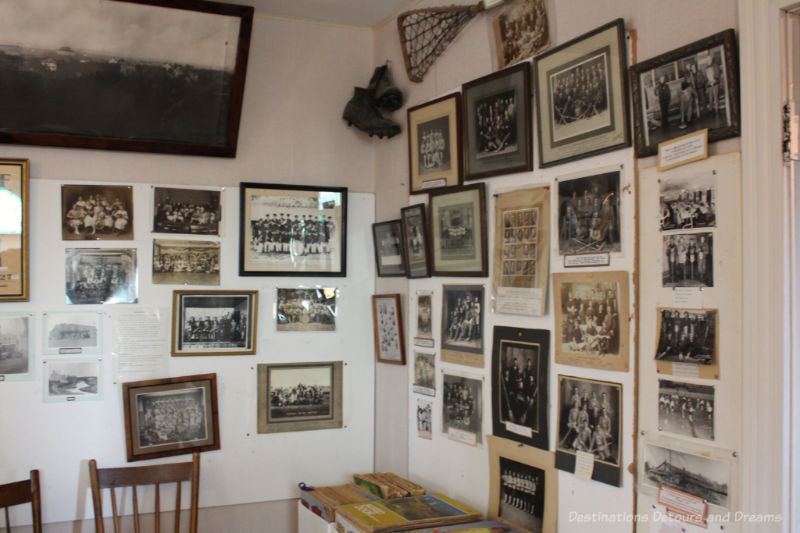 A collection of photos on walls at a museum