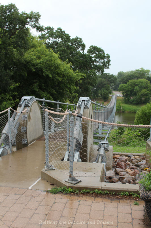 Pedestrian suspension bridge crossing river