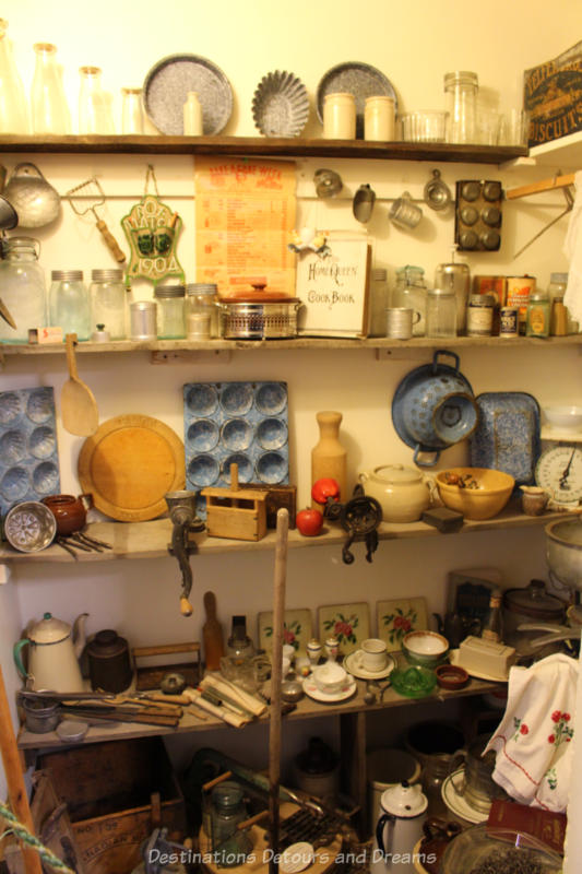 Sipiweske Museum Pioneer Life Kitchen Supplies Museum display showing shelves of pioneer kitchen supplies