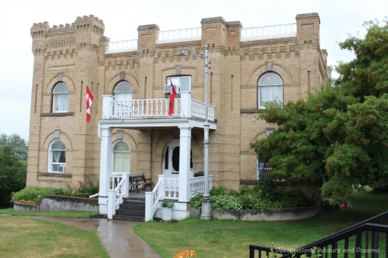 A grand stone two-story brick home now museum