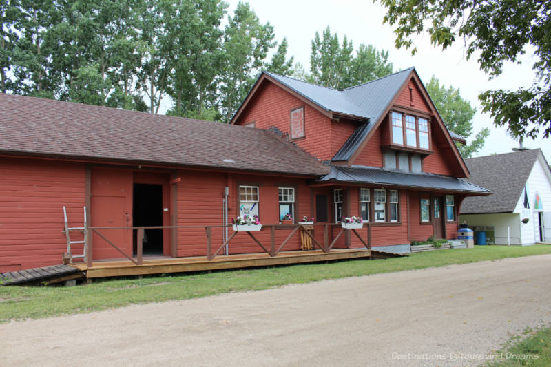 Old red wood railway station serves as entrance to multi-building museum