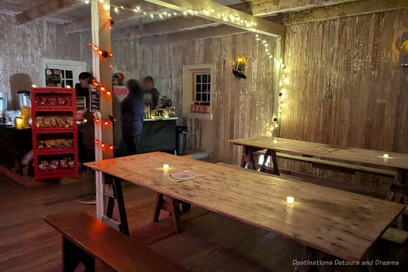 Long wood tables in a wood tavern